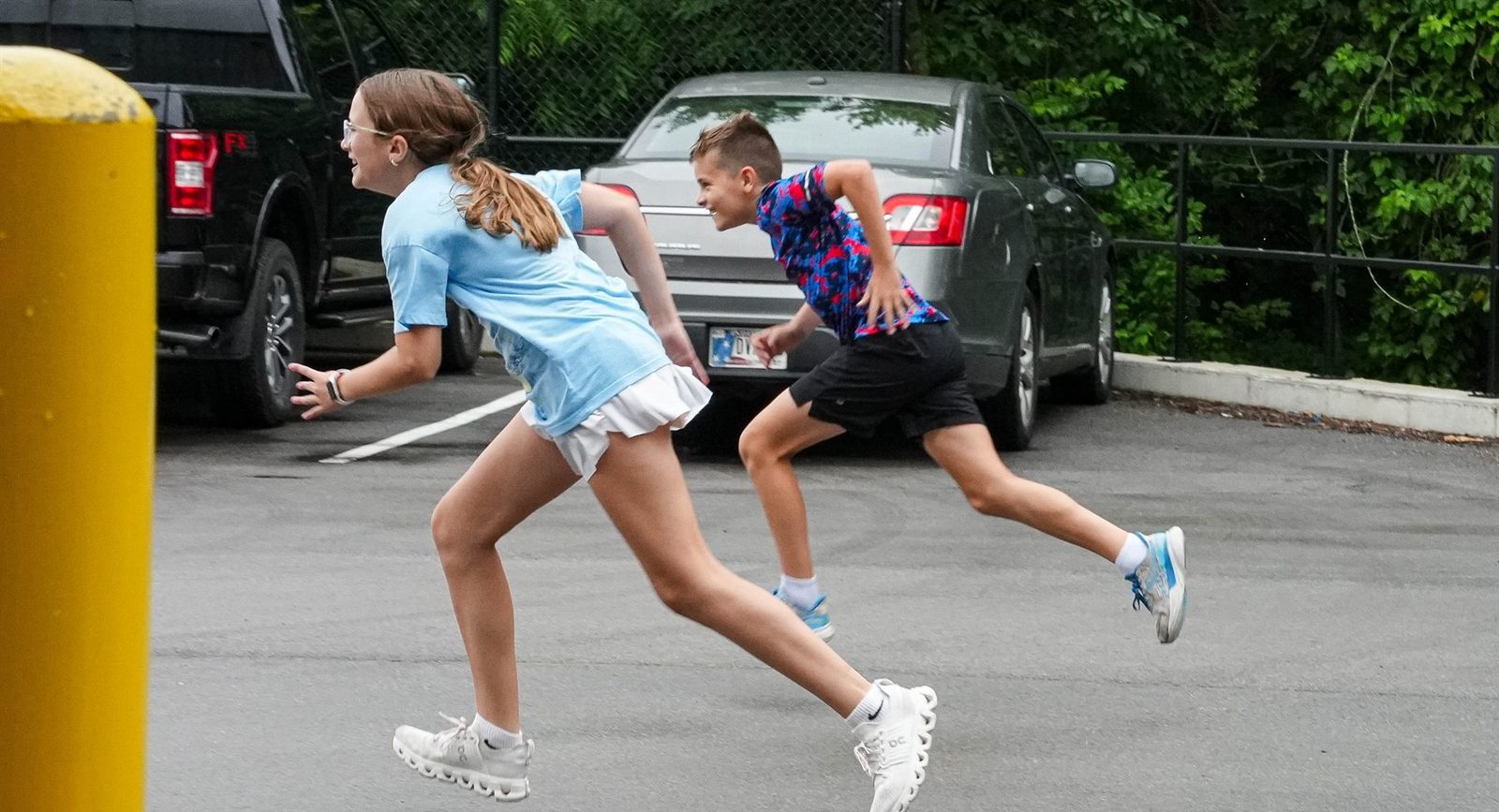 Two athletes driving out of a sprint start